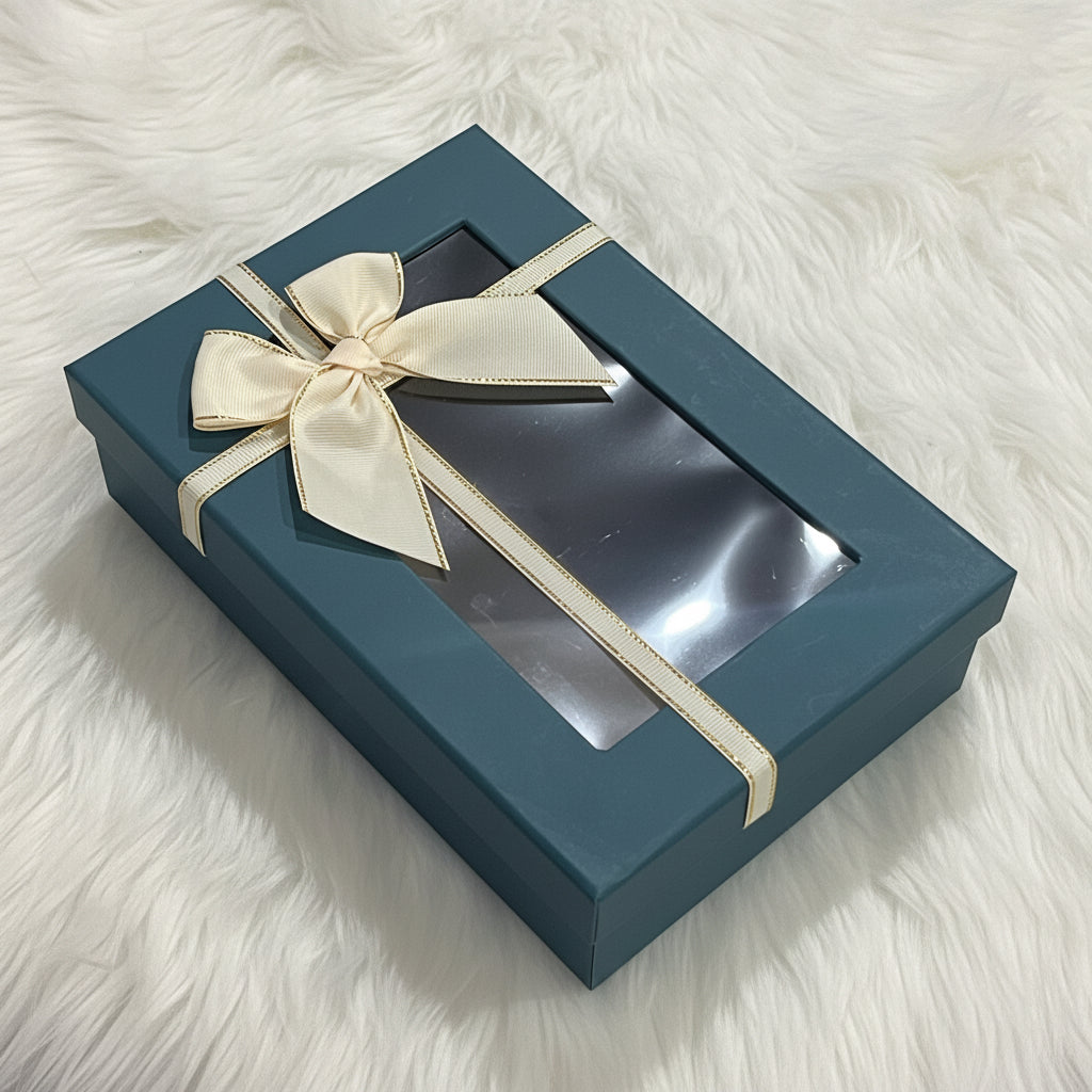 Empty gift box with clear lid and ribbon